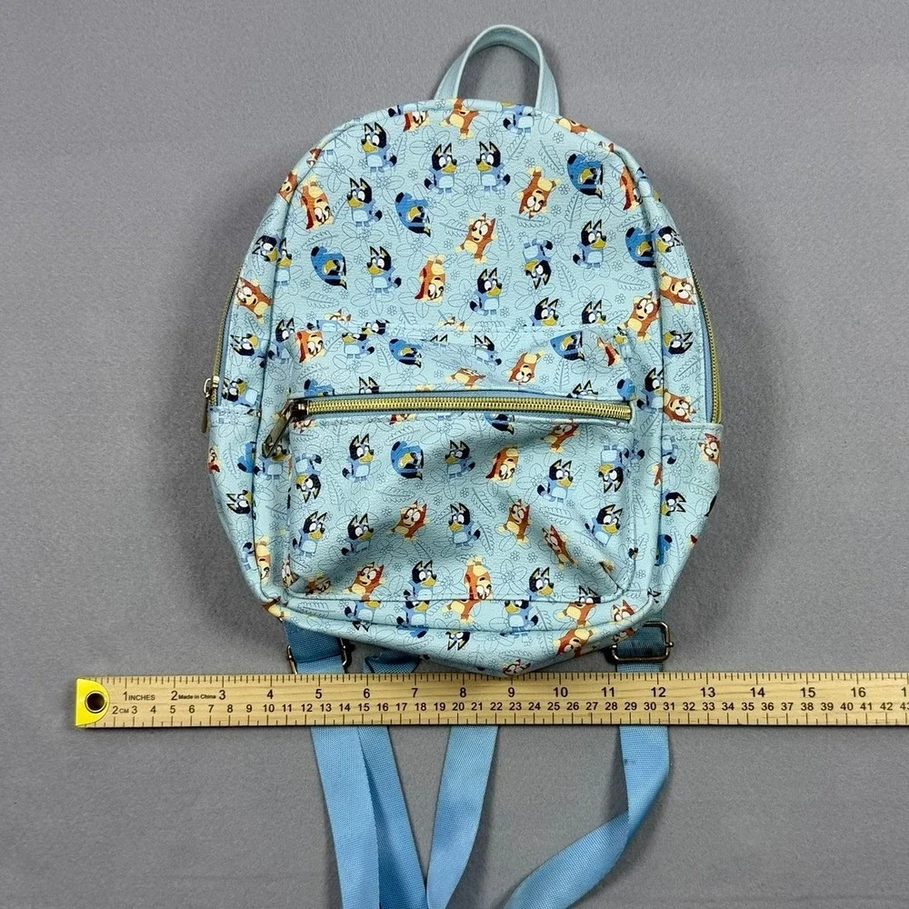 Bluey and Bingo All Over Print Mini Backpack Light Blue Gold Zipper Pocket